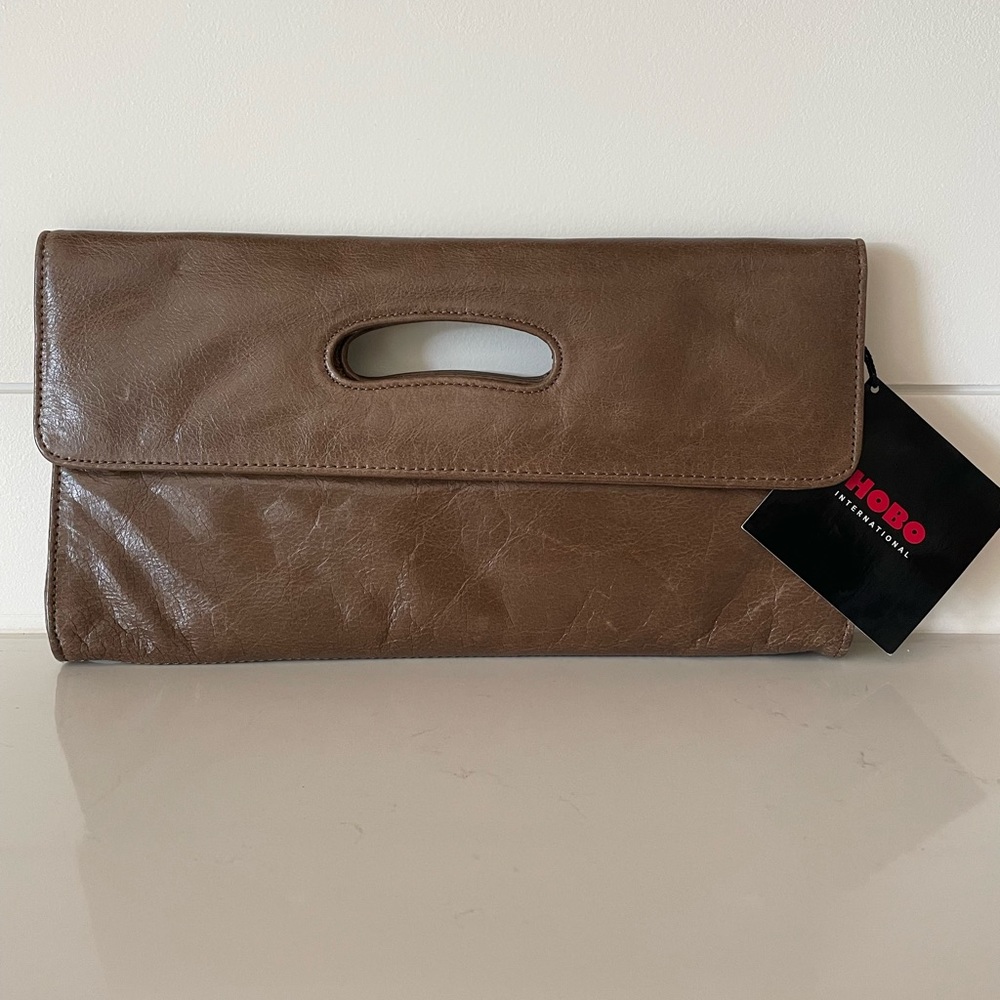 HOBO International large brown leather clutch.